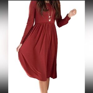 Women’s size medium pleated swing dress deep red color